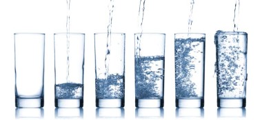pouring water in a glass